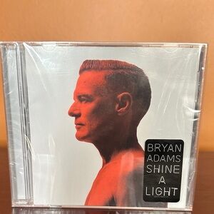 Bryan Adam’s cd Shine A Light. Still sealed